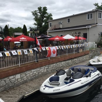 The Bobcaygeon Inn - Patio and boat tie up area - Pubs Near Me - Bobcaygeon, Ontario The Bobcaygeon Inn - Patio and boat tie up area - Pubs Near Me - Bobcaygeon, Ontario