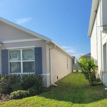 Dr Horton - Neighboring homes on same street with gutters - Home Developers Near Me - Tampa, Florida Dr Horton - Neighboring homes on same street with gutters - Home Developers Near Me - Tampa, Florida
