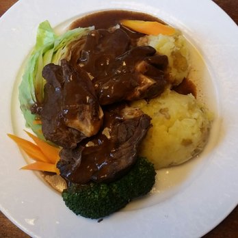 Pingvinen - Slow Cooked Reindeer Neck - with mashed potatoes, potato wedges and pepper sauce - Scandinavian Near Me - Bergen, 12 Pingvinen - Slow Cooked Reindeer Neck - with mashed potatoes, potato wedges and pepper sauce - Scandinavian Near Me - Bergen, 12