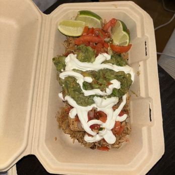 Barberitos - Burrito Bowl. As you can see, the rice barely covered the bottom. It was the same on the other side under the limes. - Tex-Mex Near Me - Greensboro, North Carolina