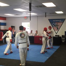 Nelson's Martial Arts - A group earning their belts at a belt test.