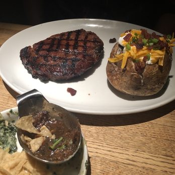 Bartlett's - Spinach dip, 100  hour marinated steak and loaded baked potato - Steakhouses Near Me - Austin, Texas