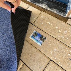 Safe Harbor Cabrillo Isle - That's Debbie's hand leaving my card underneath the mat in front of the office