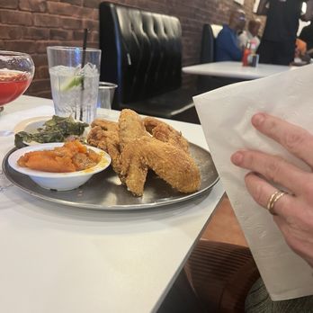 T's Brunch Bar - Fried Catfish served with mac-n-cheese and collards - Breakfast & Brunch Near Me - Atlanta, Georgia