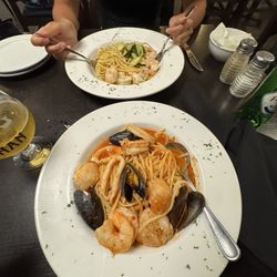 Casa Mia Cafe - our plates seafood linguine and shrimp and garlic pasta with zucchini
