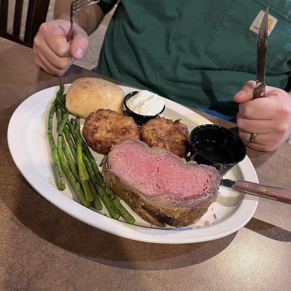 Dawsons On Main - This is the Prime Rib with potato cakes and asparagus. It was like butter! He couldn't finish it!! - American Near Me - Indianapolis, Indiana
