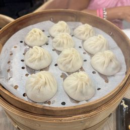 Soup dumplings served piping hot! Soup dumplings served piping hot!