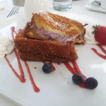 Latitudes - Sunset Key Cottages - Cornflake crusted french toast stuffed with berries and cream cheese. Whaaaaattt! - Seafood Near Me - Key West, Florida Latitudes - Sunset Key Cottages - Cornflake crusted french toast stuffed with berries and cream cheese. Whaaaaattt! - Seafood Near Me - Key West, Florida