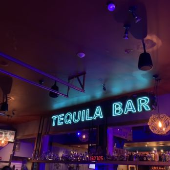 Xaco Taco - a bar with a neon sign - Mexican Near Me - Providence, Rhode Island