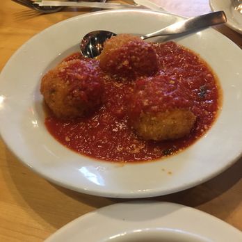 The Tomato Cafe - Arancini smothered in tomato sauce. A bit soggy from the sauce. - Pizza Near Me - Fishkill, New York