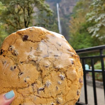 Multnomah Falls Snack Bar - a hand holding a cookie - Coffee & Tea Near Me - Multnomah Falls, Oregon Multnomah Falls Snack Bar - a hand holding a cookie - Coffee & Tea Near Me - Multnomah Falls, Oregon