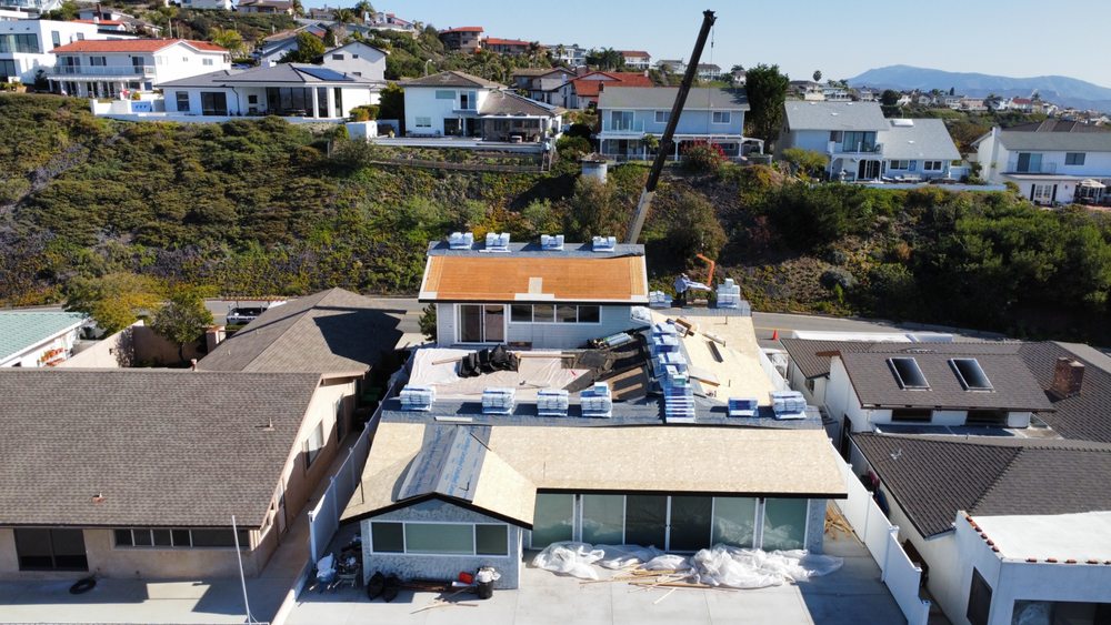 Slide of New Village Roofing