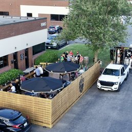 Exterior outside entrance of Sapwood Cellars Brewery - Our patio seen from above. - Columbia, Maryland Exterior outside entrance of Sapwood Cellars Brewery - Our patio seen from above. - Columbia, Maryland
