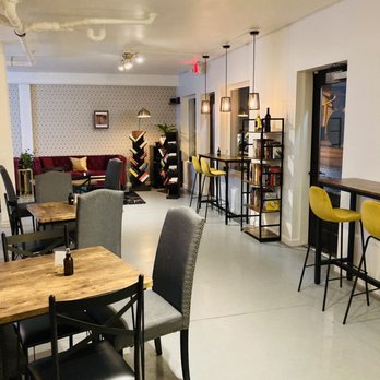 The Vibrary - Wine & Bookbar - Cute tables and seating areas - Wine Bars Near Me - Stone Mountain, Georgia The Vibrary - Wine & Bookbar - Cute tables and seating areas - Wine Bars Near Me - Stone Mountain, Georgia