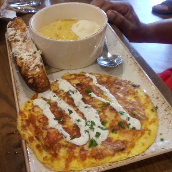 First Watch - Salmon  omelette with grits and ciabotta toast - Breakfast & Brunch Near Me - Lauderhill, Florida