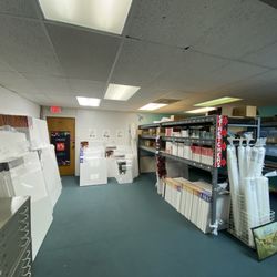 Art & Frame Of Sarasota - The third floor canvas section.