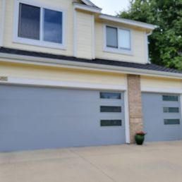The garage doors before our contractors painted them and the rest of the house The garage doors before our contractors painted them and the rest of the house