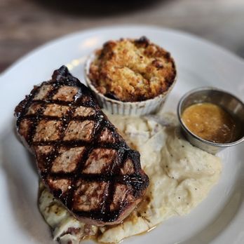 Jeffrey Adams on Fourth - 12oz New York Strip, mashed potatoes, and smoked gouda Mac and cheese - Steakhouses Near Me - Winston-Salem, North Carolina Jeffrey Adams on Fourth - 12oz New York Strip, mashed potatoes, and smoked gouda Mac and cheese - Steakhouses Near Me - Winston-Salem, North Carolina