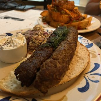 Kitty Dare - Koobideh kabob appetizer and potato wedge side - Mediterranean Near Me - Atlanta, Georgia Kitty Dare - Koobideh kabob appetizer and potato wedge side - Mediterranean Near Me - Atlanta, Georgia