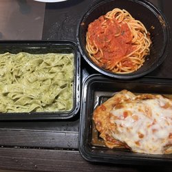 Pulcinella Restaurant - Fettuccine pesto and Eggplant Parmigiana comes with spaghetti