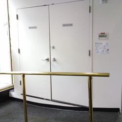 HSBC Bank - Brilliant bank layout concept:  hide the utility closet behind railings, & close the other end up with ATM machines