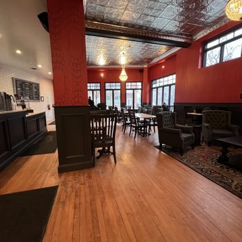 Black Cat Coffee - a wood floor and red walls - Coffee & Tea Near Me - Mount Clemens, Michigan Black Cat Coffee - a wood floor and red walls - Coffee & Tea Near Me - Mount Clemens, Michigan
