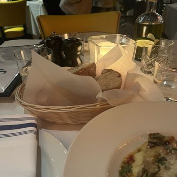 Serafina - West 105th - The table setup with bread basket - Italian Near Me - New York, New York Serafina - West 105th - The table setup with bread basket - Italian Near Me - New York, New York