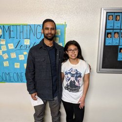 Jan Pequeño - With second year guitar student, Carolina Fuentes, after the 2019 Edward J. Richardson Middle School talent show: