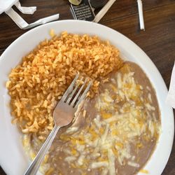 Tacos Aguililla Food Truck - Order of rice and beans Chili Colorado Chicken torta 1 asada taco , 1 pastor Horchata