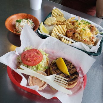 Dune Dog Cafe - Crab cake sandwitch with a side of Cole slaw ( which was great!) And the sea dogs.! Great taste! - American Near Me - Jupiter, Florida