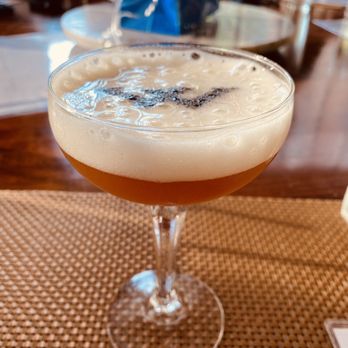 Oak Steakhouse - Emerald City Sour cocktail. - Steakhouses Near Me - Raleigh, North Carolina
