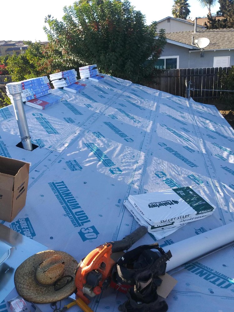 Slide of Father And Son Roofing.