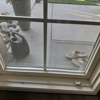 Squeaky Clean Services - Before we cleaned the interior window sill - Window Washing Near Me