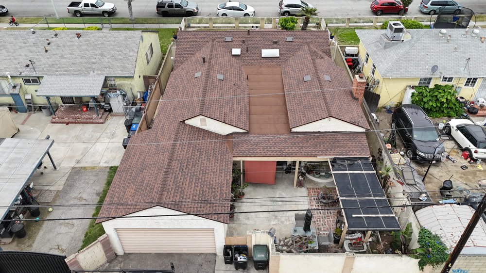 Slide of Meza Roofing Systems