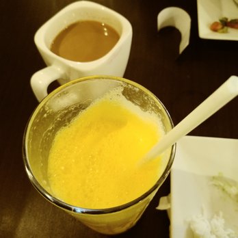 Cilantro Indian Cafe - Frothy mango lassi - Indian Near Me - Cary, North Carolina