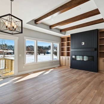 Resolute Homes - a spacious living room with a fireplace - Carpenters Near Me - Hamilton, Michigan Resolute Homes - a spacious living room with a fireplace - Carpenters Near Me - Hamilton, Michigan