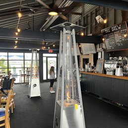a restaurant with tables and chairs