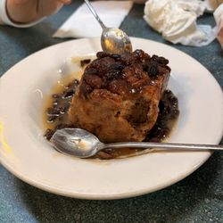 The Firehouse Restaurant - Bread pudding with rum sauce and raisins
