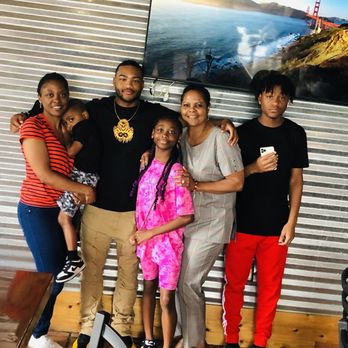 The Brisket House - Family Time at The Brisket House! My Navy son surrounded by his aunt, grandmother, and his little cousins. - Barbeque Near Me - Houston, Texas The Brisket House - Family Time at The Brisket House! My Navy son surrounded by his aunt, grandmother, and his little cousins. - Barbeque Near Me - Houston, Texas