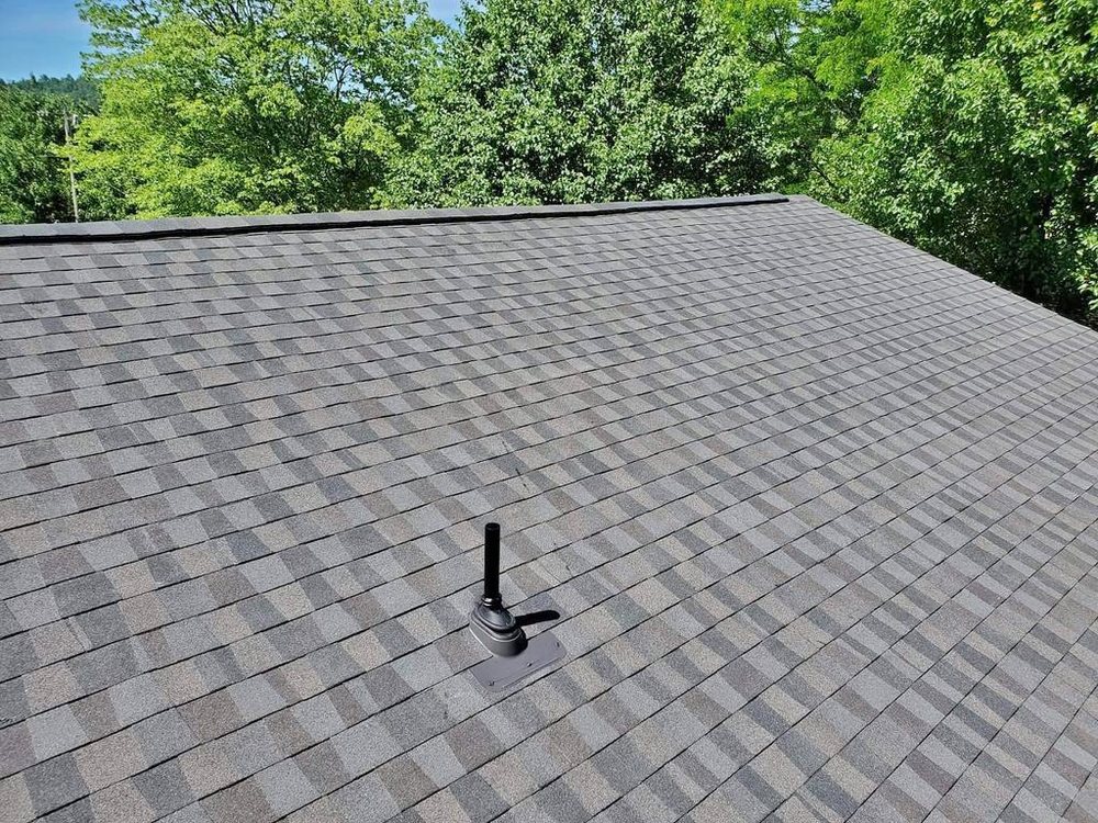 Slide of Shield Roofing & Construction