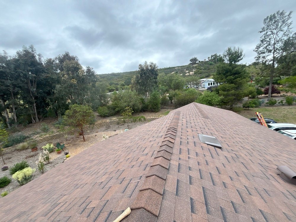 Slide of Triark Roofing