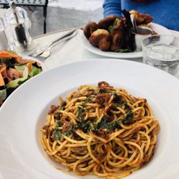Spaghetti Bolognese, salad and beignets Spaghetti Bolognese, salad and beignets