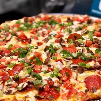 Round Table Pizza - Italian Garlic Supreme: Pepperoni, Italian sausage, tomatoes, mushrooms, green onions, and creamy garlic sauce - Pizza Near Me - Half Moon Bay, California Round Table Pizza - Italian Garlic Supreme: Pepperoni, Italian sausage, tomatoes, mushrooms, green onions, and creamy garlic sauce - Pizza Near Me - Half Moon Bay, California