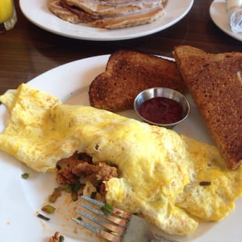 Hen House Eatery - Cinnamon roll pancakes and a custom built chorizo omelette. - Breakfast & Brunch Near Me - Minneapolis, Minnesota