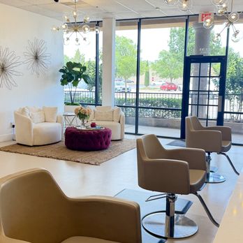 Bombshell Beauty Bar - Styling stations with a view of outdoor landscape through our lounge area. - Hair Stylists Near Me - The Village, Oklahoma Bombshell Beauty Bar - Styling stations with a view of outdoor landscape through our lounge area. - Hair Stylists Near Me - The Village, Oklahoma