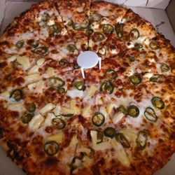 Lomatos Pizza - Jalapeno - half with pineapple and the other with cream cheese.