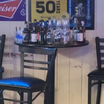 Huggys - a bar with a billiards sign on the wall - Bars Near Me - Hanford, California