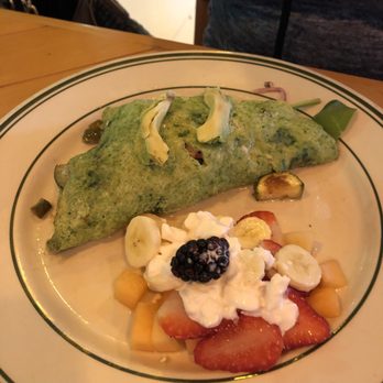 Caoba - Spinach omelette with veggies inside and fruit on the side. They make the actual omelette with spinach! - Mexican Near Me - Rosarito, BCN