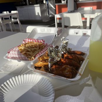 Chex Grill & Wings - Family Special: Box of Fries, 20 wings, 1/2 gallon of lemonade (sauces included, but not pictured) - Sandwiches Near Me - Charlotte, North Carolina Chex Grill & Wings - Family Special: Box of Fries, 20 wings, 1/2 gallon of lemonade (sauces included, but not pictured) - Sandwiches Near Me - Charlotte, North Carolina
