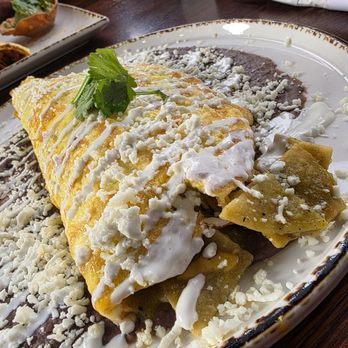 Madres Brunch - Chilaquiles omelette...delish...wish the chilaquiles were spicier - Breakfast & Brunch Near Me - Bellflower, California